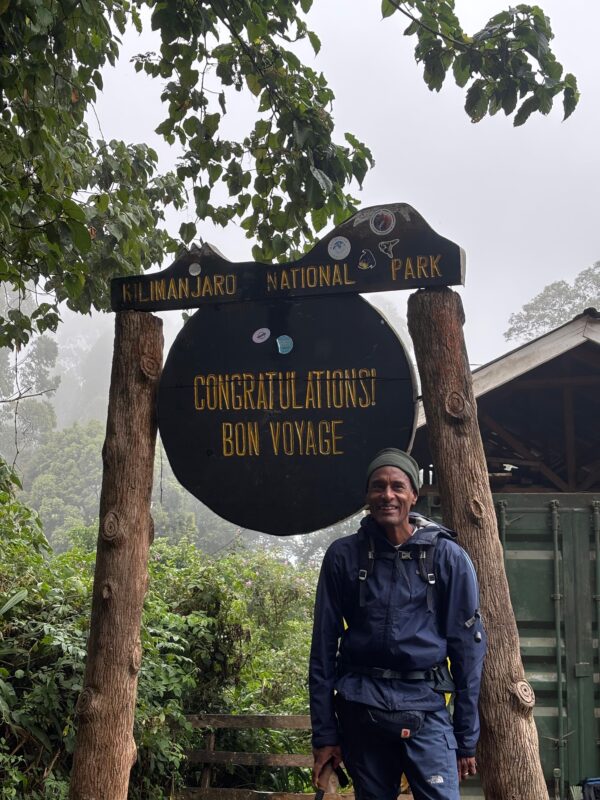 a photo of alex climbing the kilimanyaro for Cancer Support