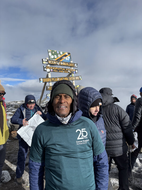 a photo of alex climbing the kilimanyaro for Cancer Support